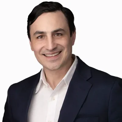 Corporate headshot example — Portland studio (executive in navy suit)