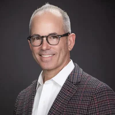 Actor headshot example — Portland studio (character actor in plaid jacket)