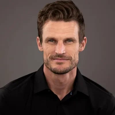 Actor headshot example — Portland studio (dramatic look in black shirt)