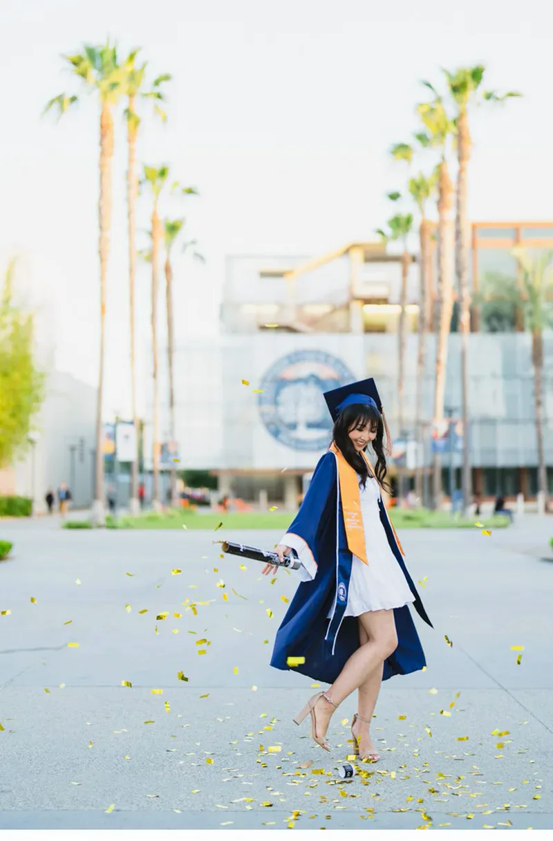 Confetti popper graduation portrait at CSU Fullerton