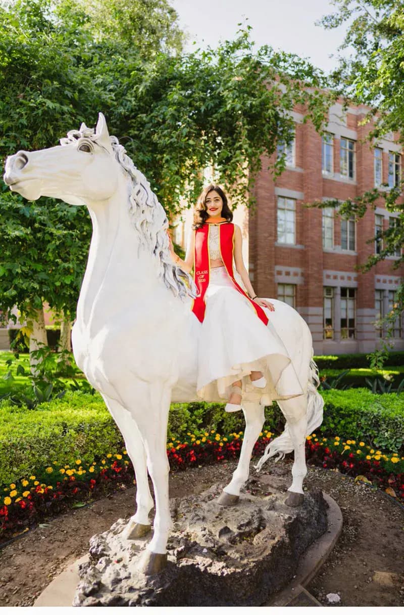 Traveler horse statue USC graduation portrait