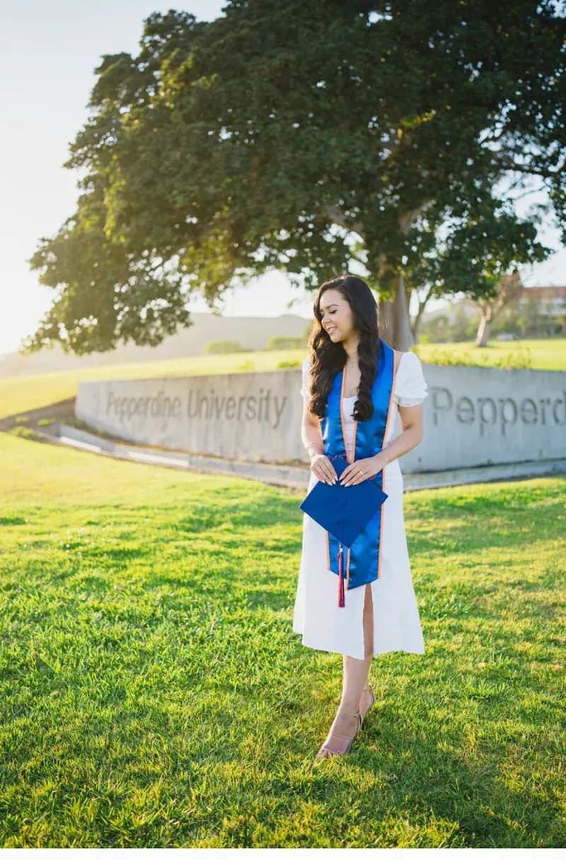 Cap and sash Pepperdine University graduation portrait