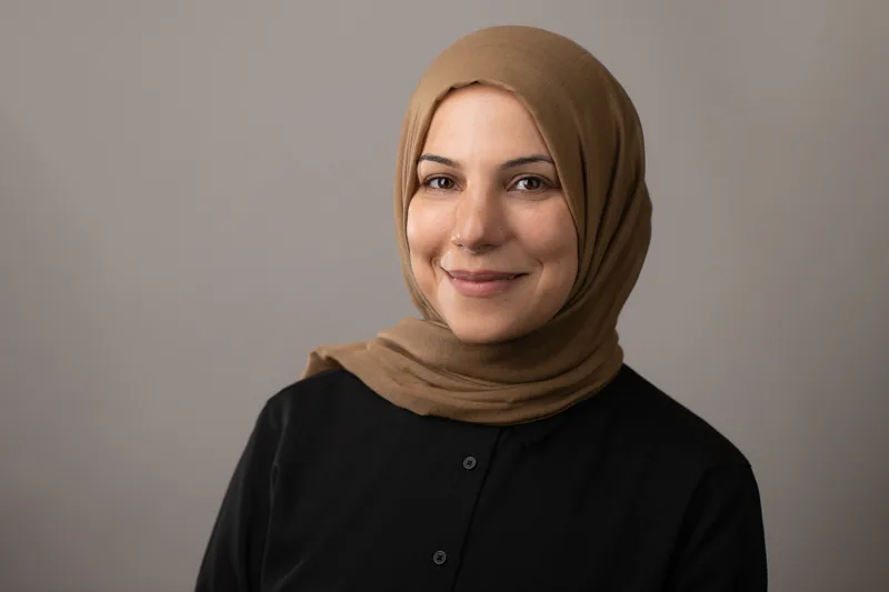 Polished professional headshot for a firm website