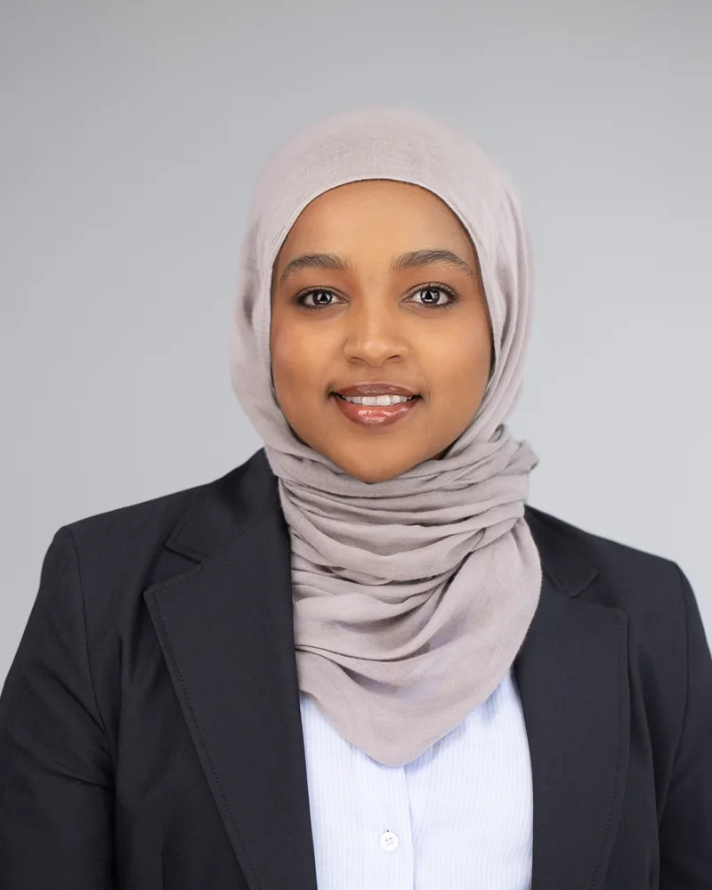 Clean LinkedIn profile headshot with soft studio lighting