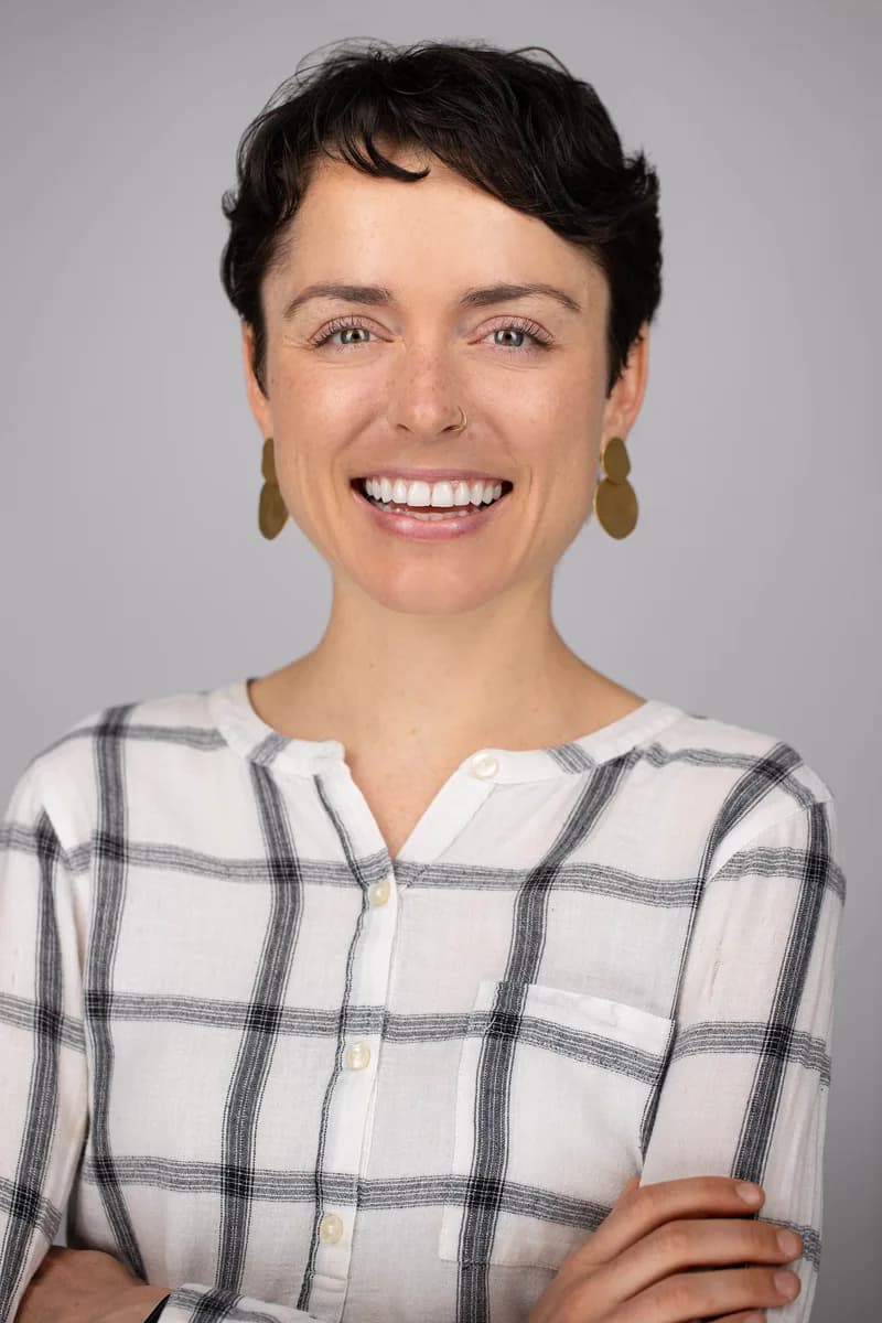 Executive headshot with matching lighting and background